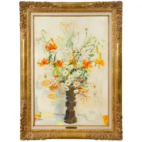 Soft pastel floral still life of a bouquet in a vase with pale yellow and pink blossoms in a gilded frame.